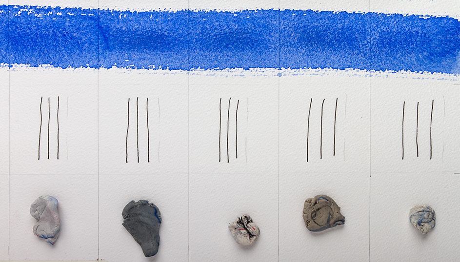 The darker rectangle in the watercolour wash were areas where these putty rubbers were rubbed before the watercolour was washed over the top. Not sure if it abrasion or greasiness caused this.