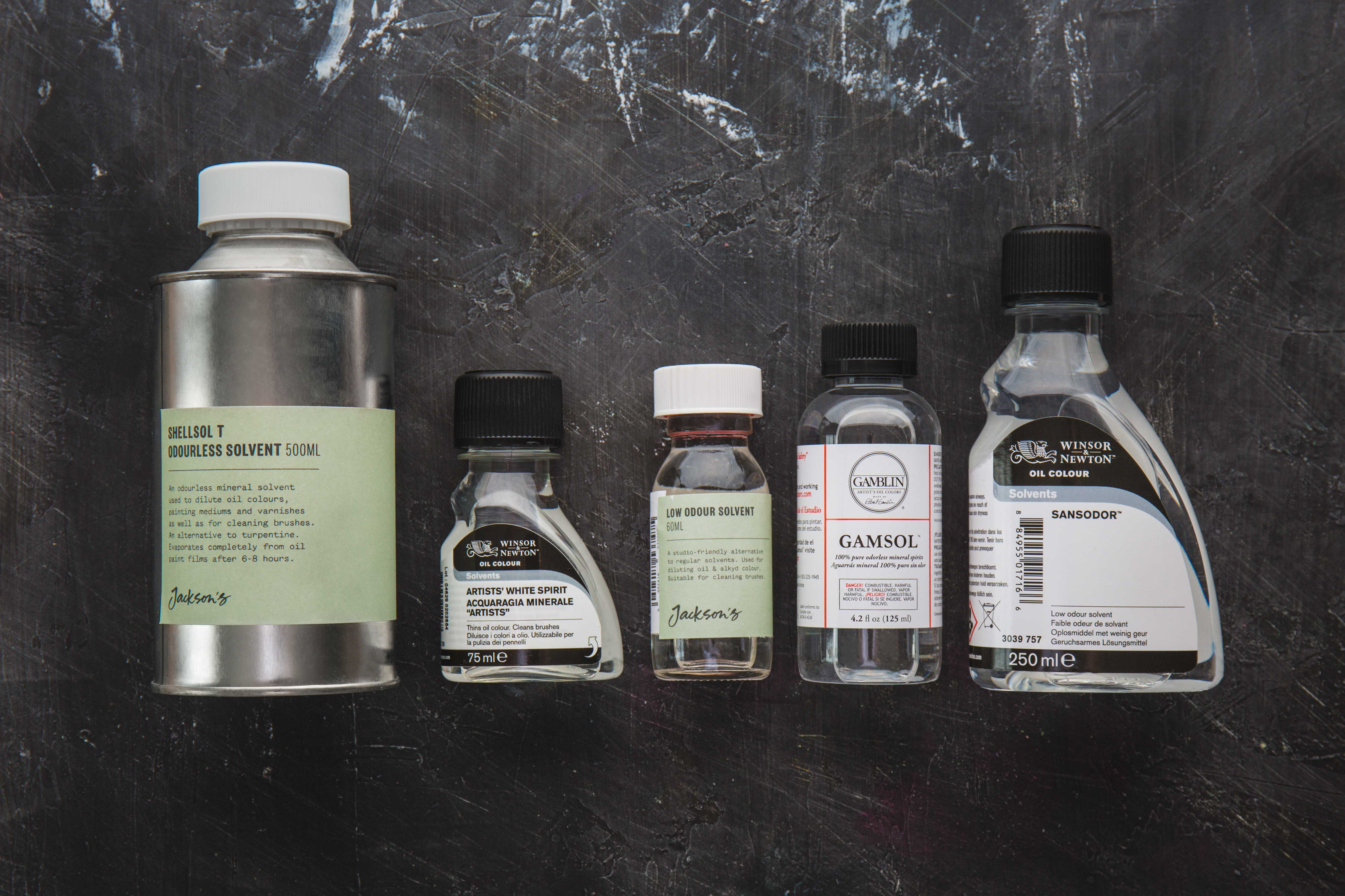 (l-r) Shellsol T, Winsor & Newton Artist White Spirit, Low Odour Solvent, Gamsol and Sansodor - all petroleum distillate based solvents