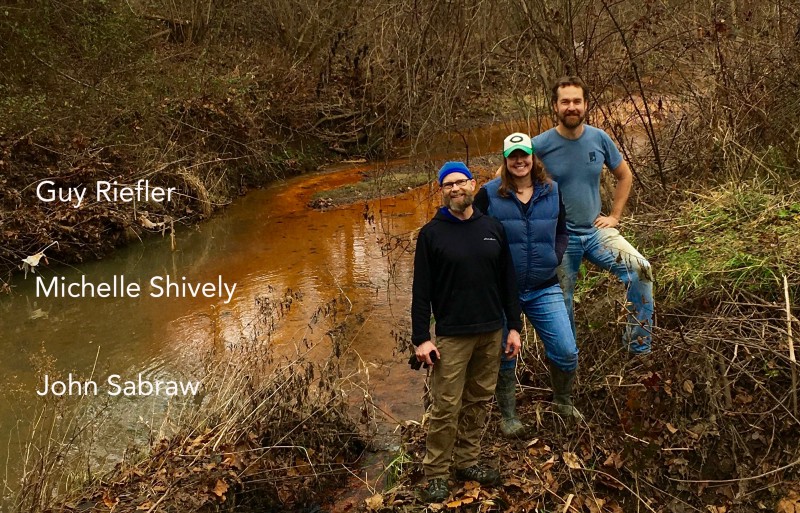 Our team- Engineer, Artist, Watershed Specialist at Sunday Creek, Corning, Ohio. ©2018 Art Boy Inc., All rights Reserved. Photo by John Sabraw. toxic paint