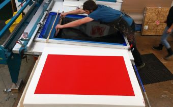 Master Printer & Owner of Serio Press, Tony Clough, working on a Cleon Peterson print