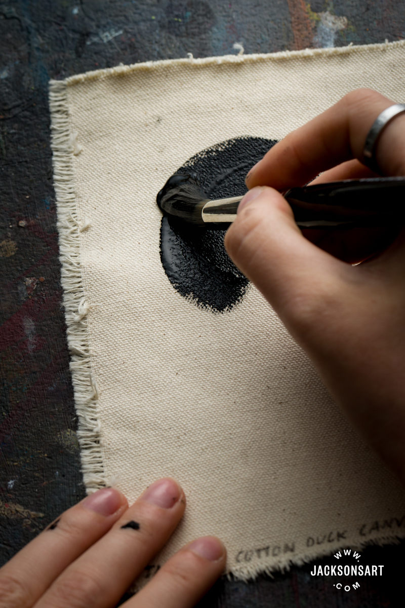 Absolute Black applied to raw canvas