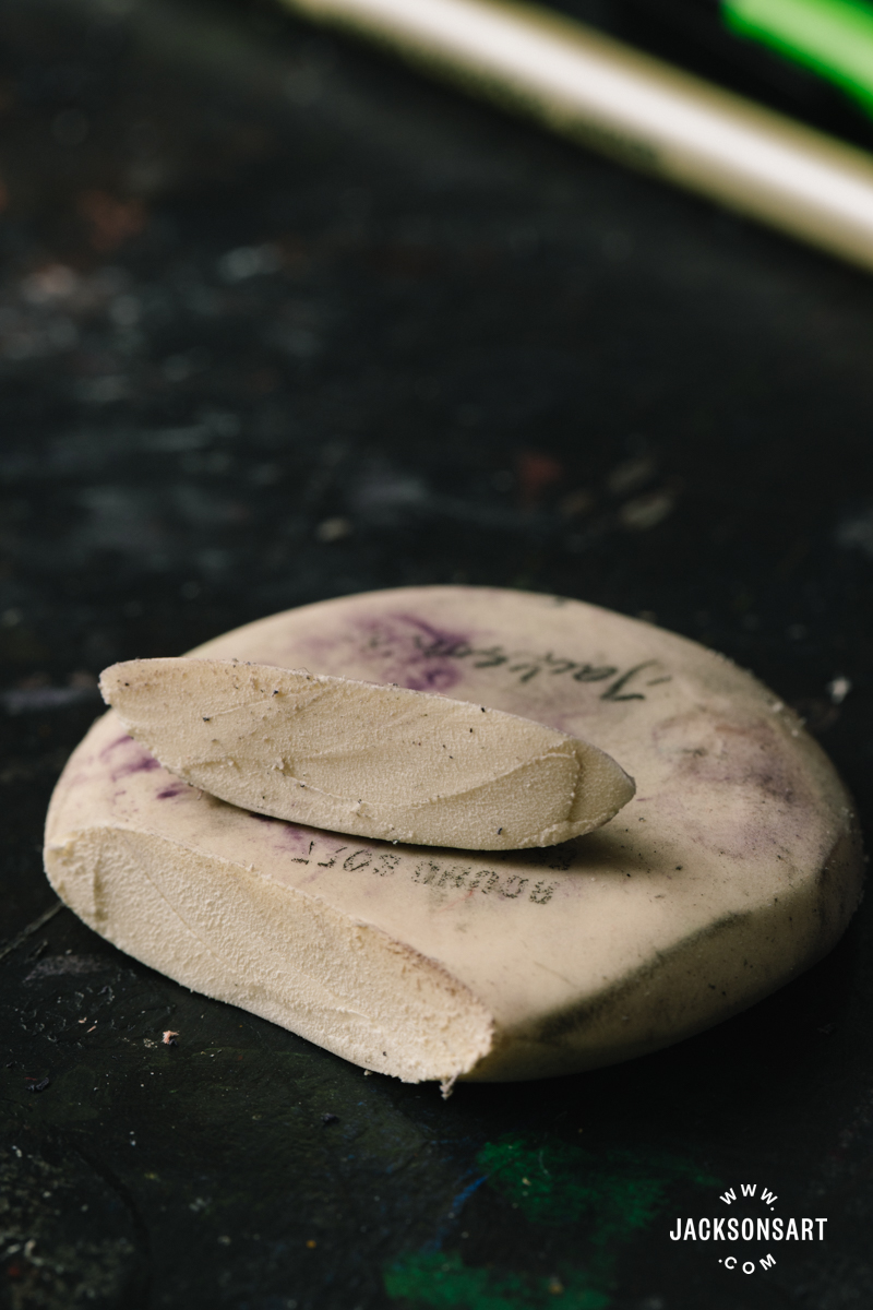 Cutting an eraser into suitable size