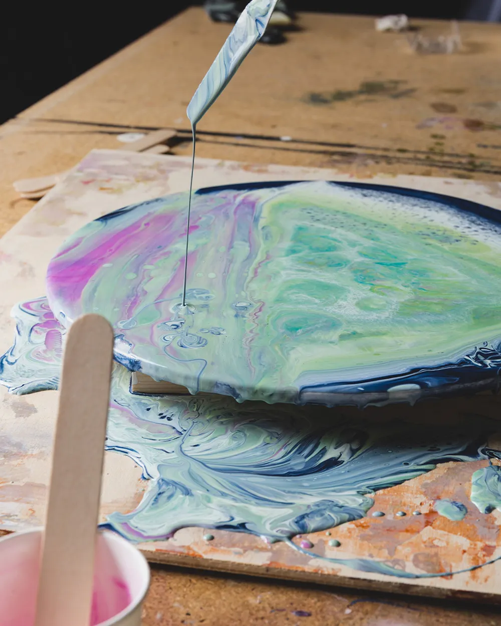 Everything you need to create a colour pour painting, including pouring medium, liquid colour, tools, and canvases and boards.