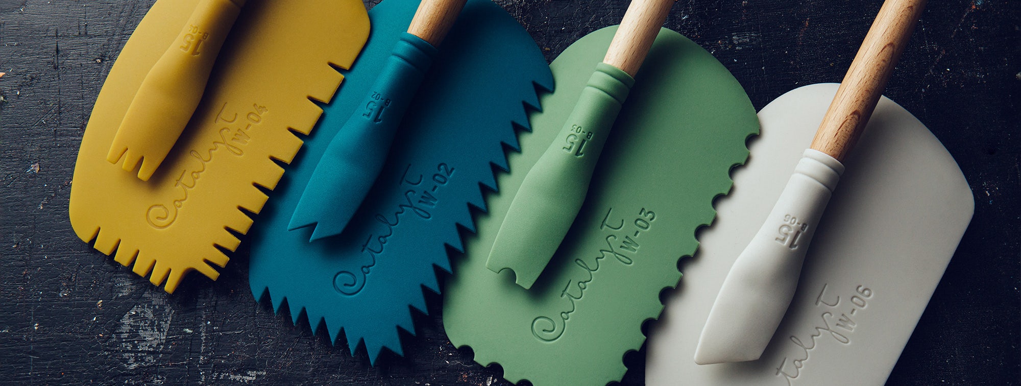 A variety of tools designed to apply paint to substrates in interesting ways, from palette knives to silicone wedges.