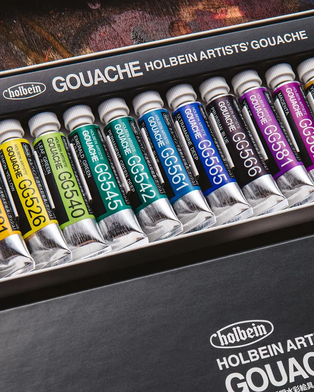 Holbein Artists Gouache in its original box on an artists table