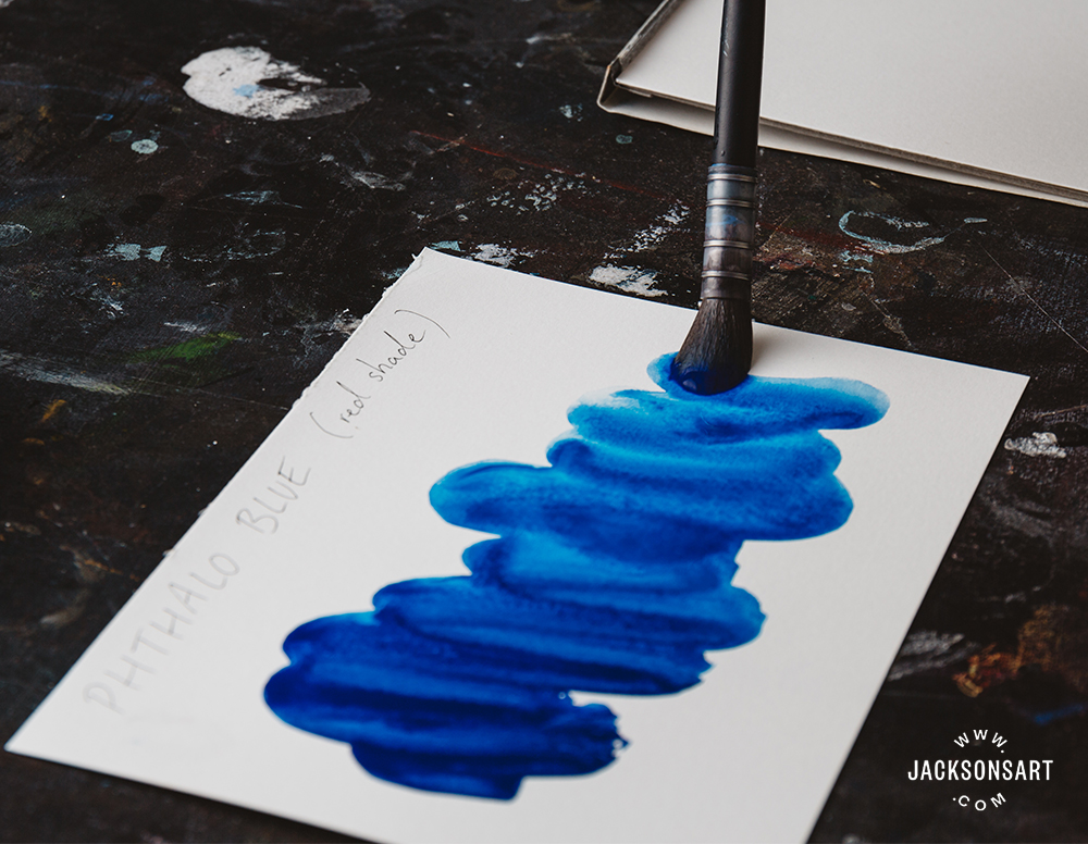 Daniel Smith Watercolour, Phthalo Blue Red Shade being painted out on watercolour paper